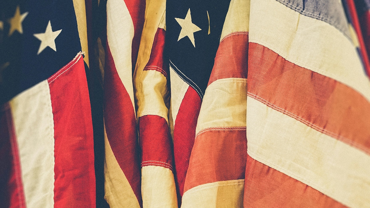 closeup photo of United States of America flag
