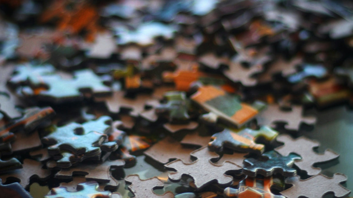 brown and black jigsaw puzzle