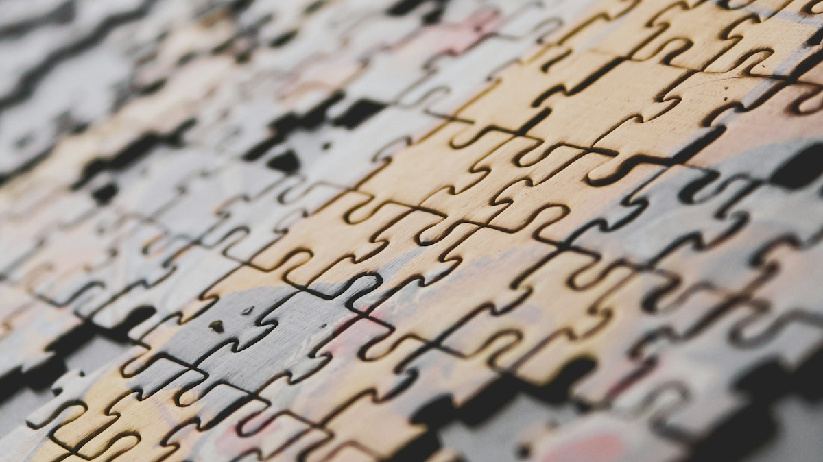 brown and black jigsaw puzzle