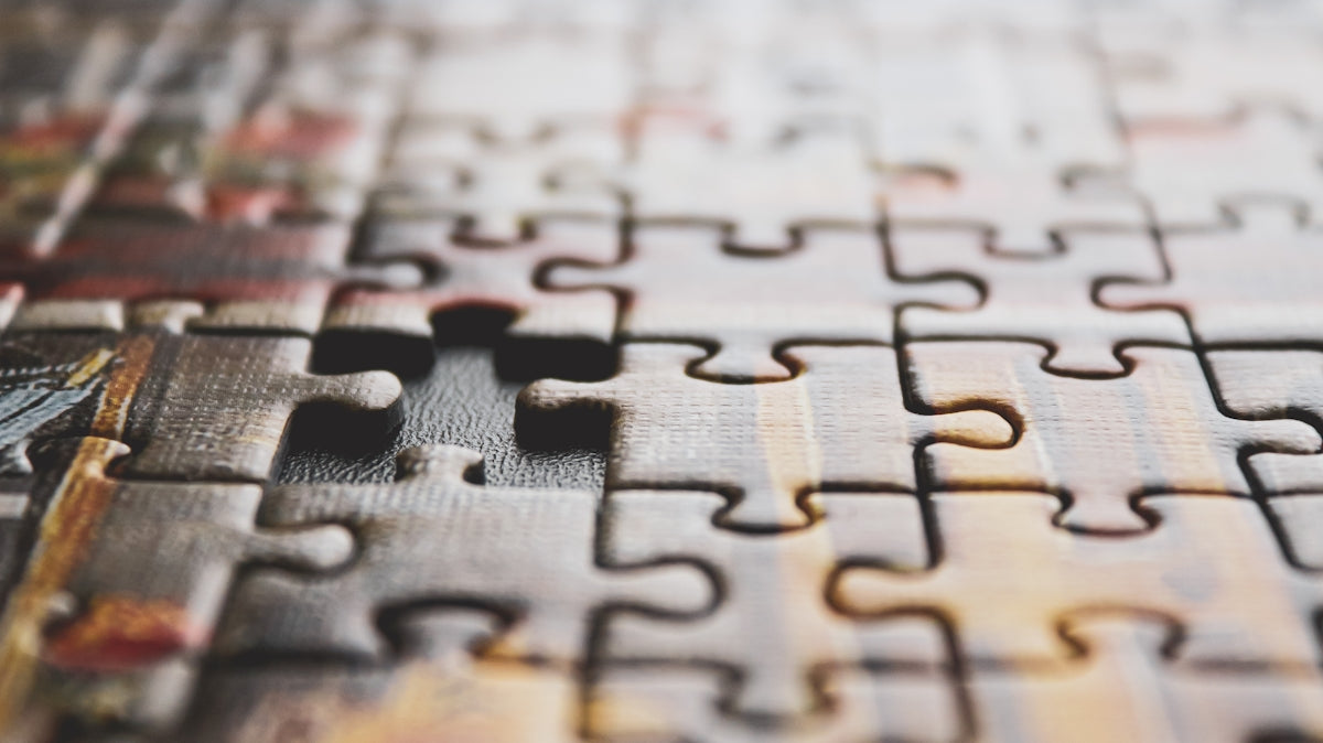 brown and black jigsaw puzzle