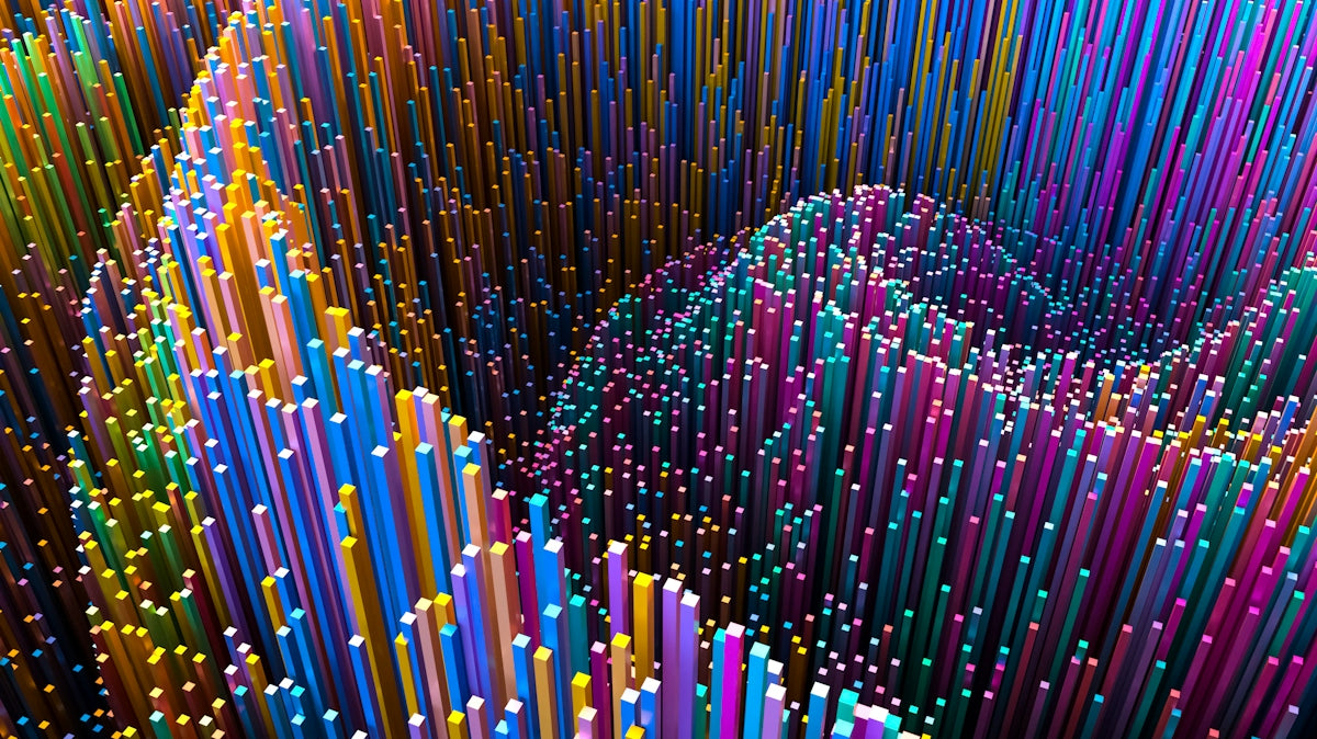 a very large group of colorful sticks in the shape of a spiral
