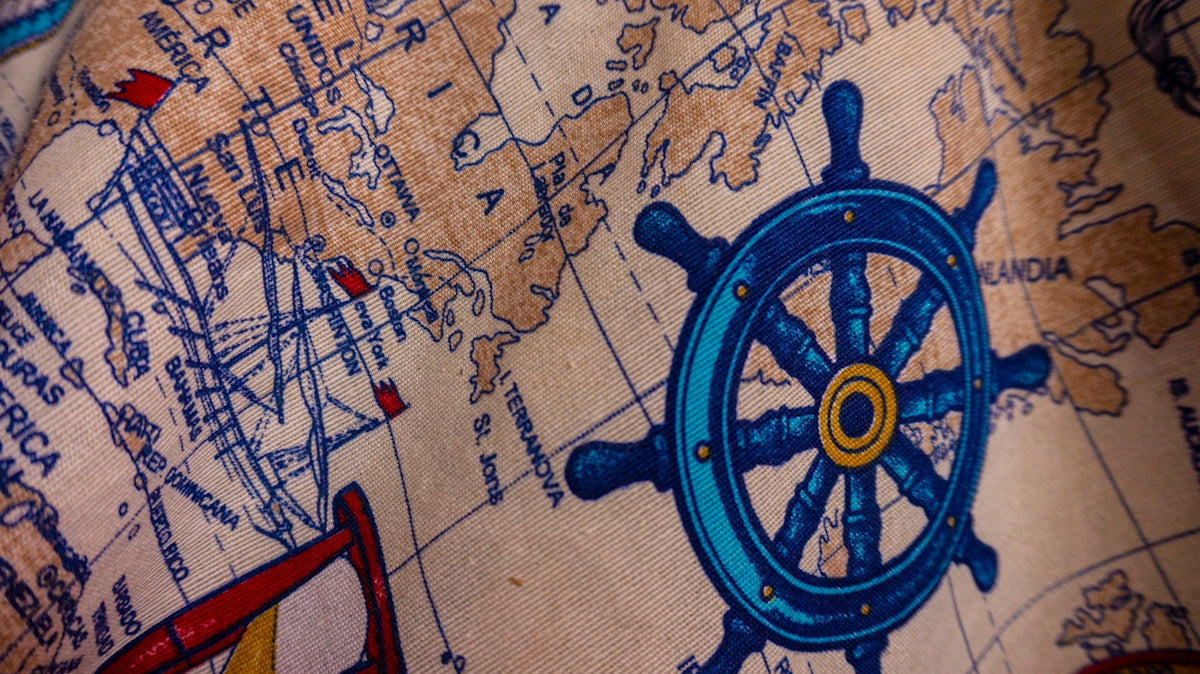 a blue toy on a map