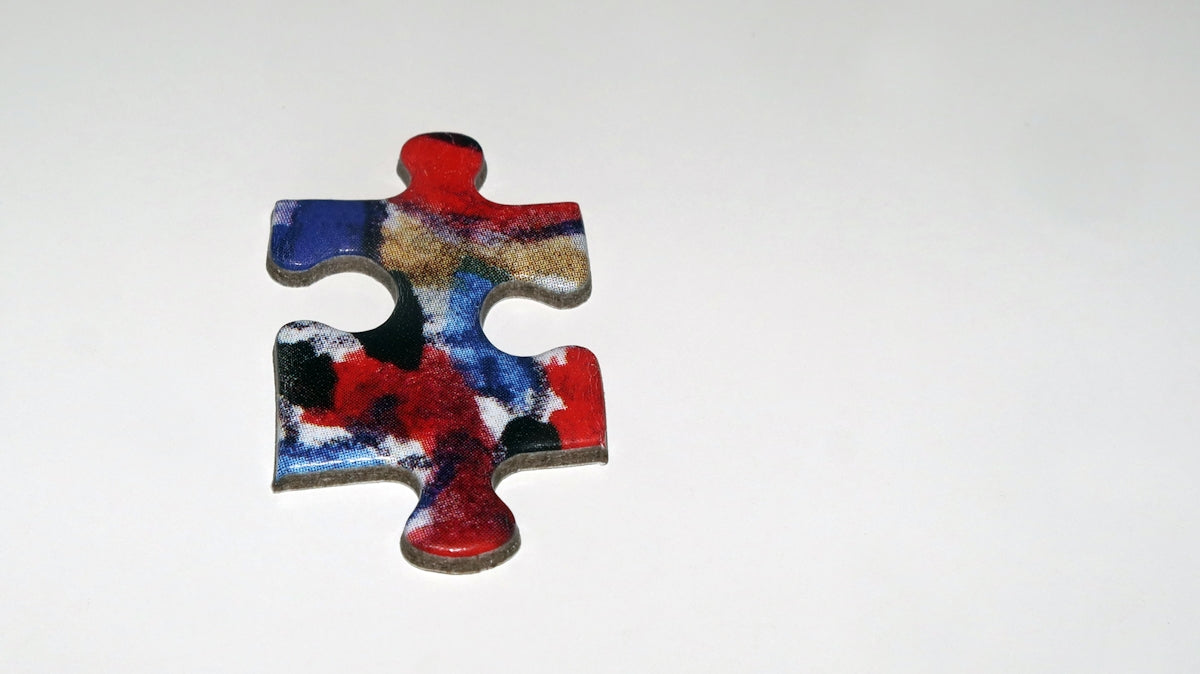 a piece of a puzzle sitting on top of a table