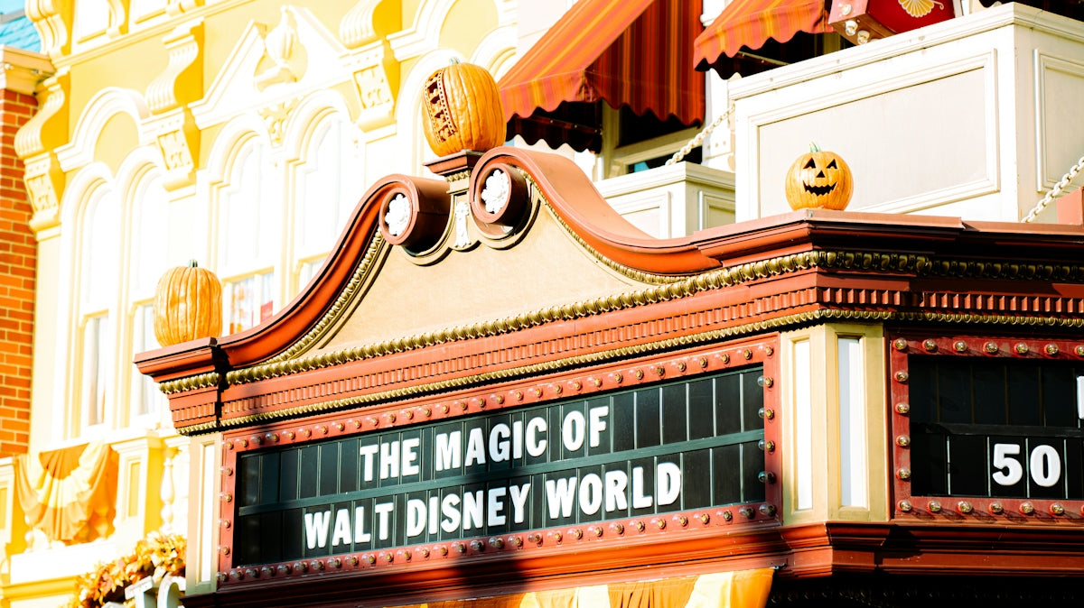 a theater marquee for the magic of walt world