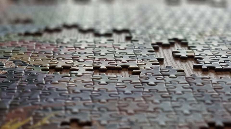 Close-up of a partially completed jigsaw puzzle