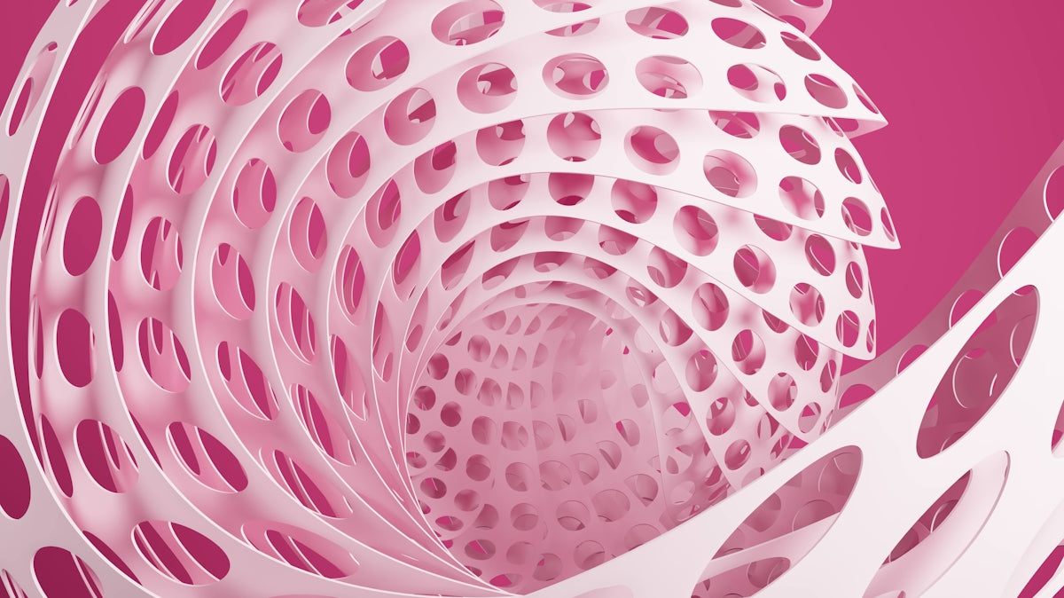 White perforated spiral abstract structure on a pink background.