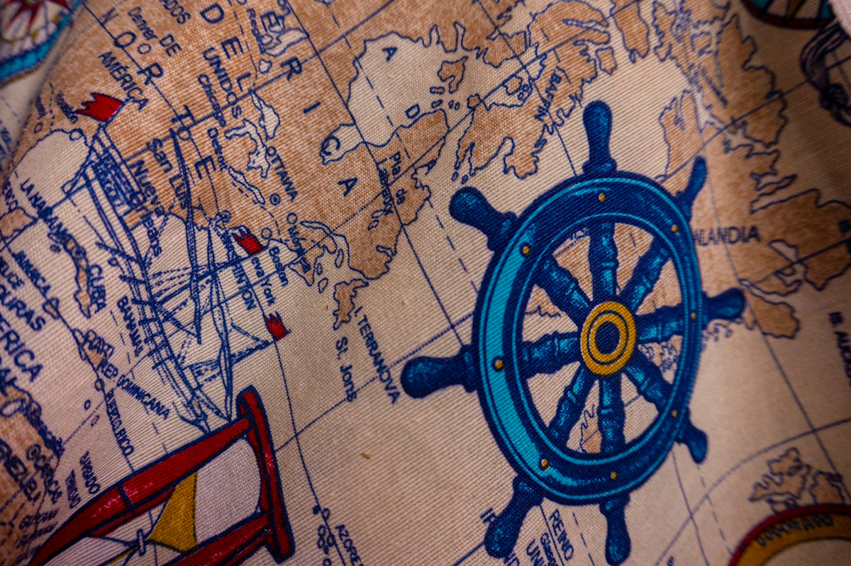 a blue toy on a map