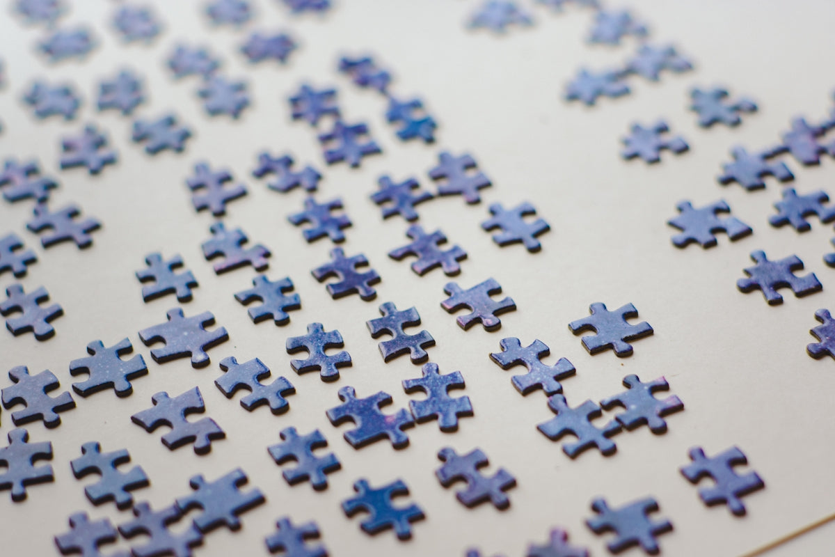 a close up of a blue puzzle piece