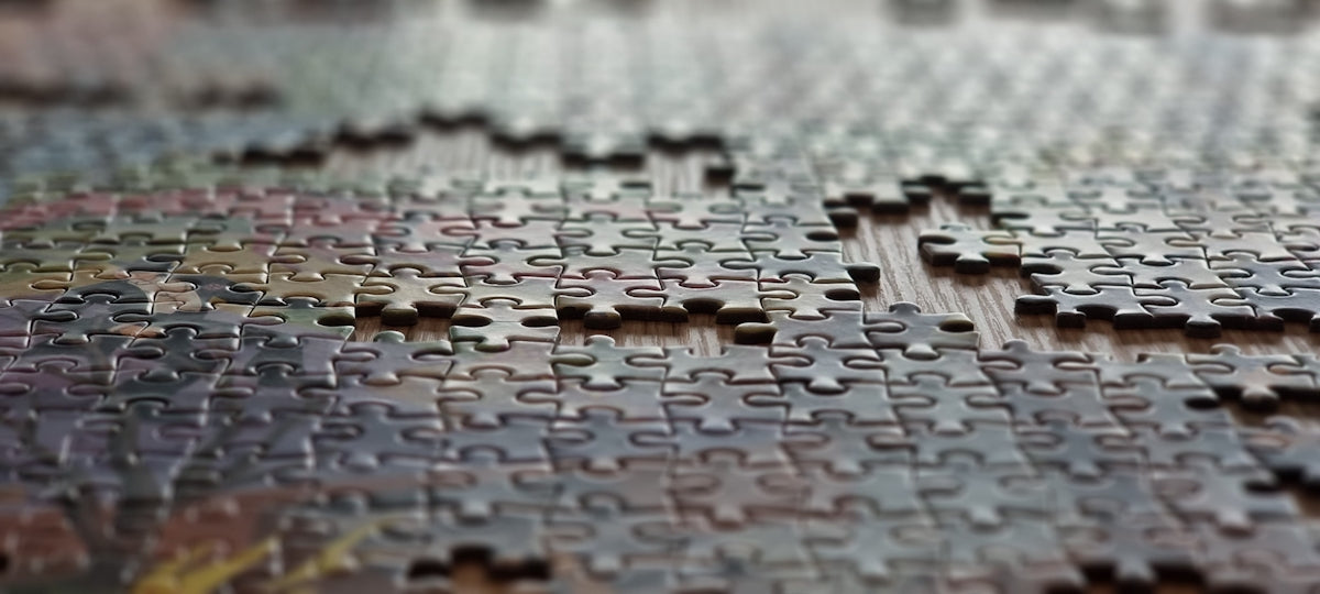 Close-up of a partially completed jigsaw puzzle